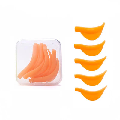 FUNMIX Silicone Lash Lift Kit with 3D eyelash perming and curling pads in orange, shown in a clear storage case and lined up for display.